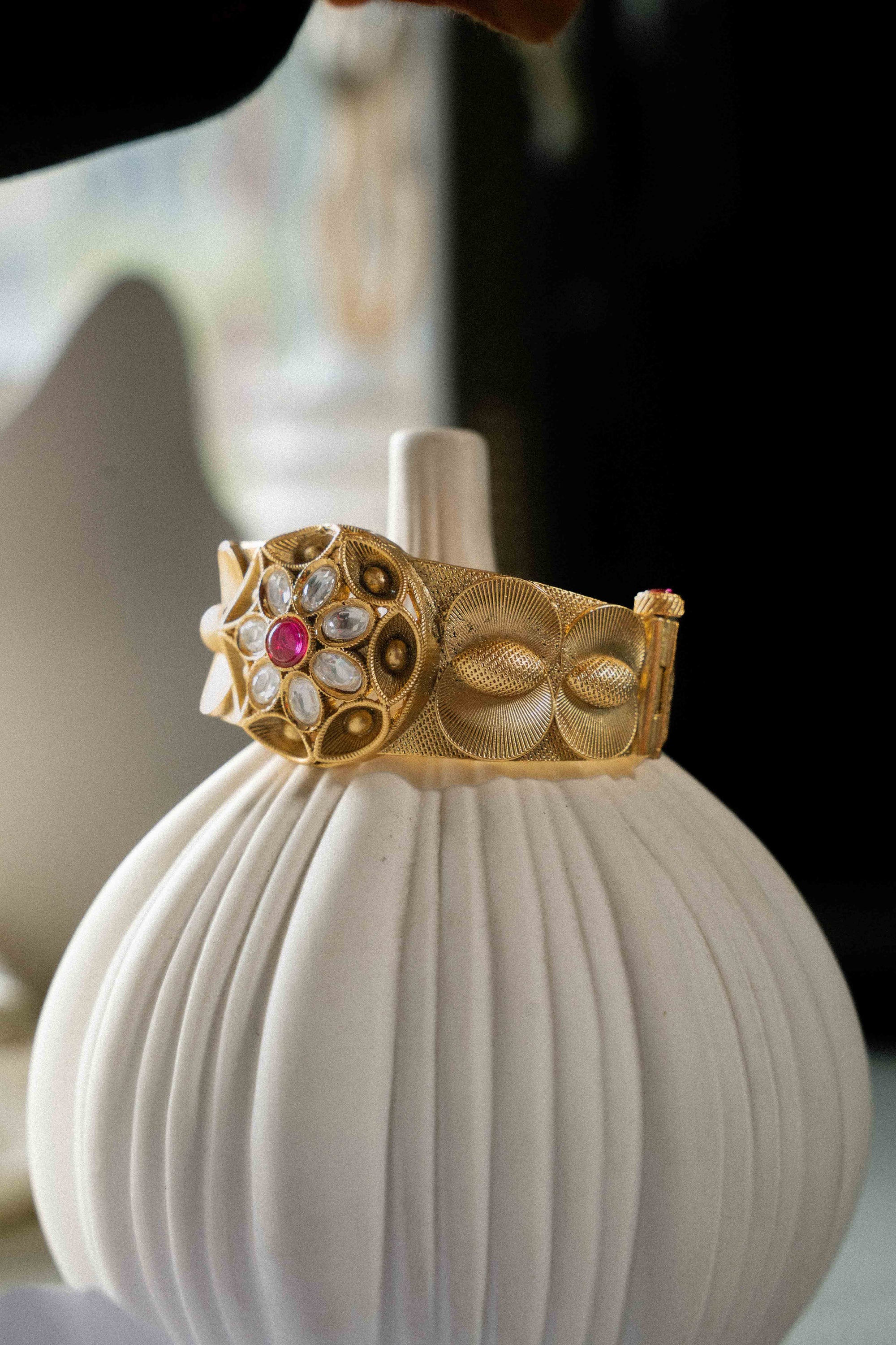 Regal Rose Bracelet by SAVIC — gold-plated bracelet with ruby centerpiece and hand-set Kundan stones